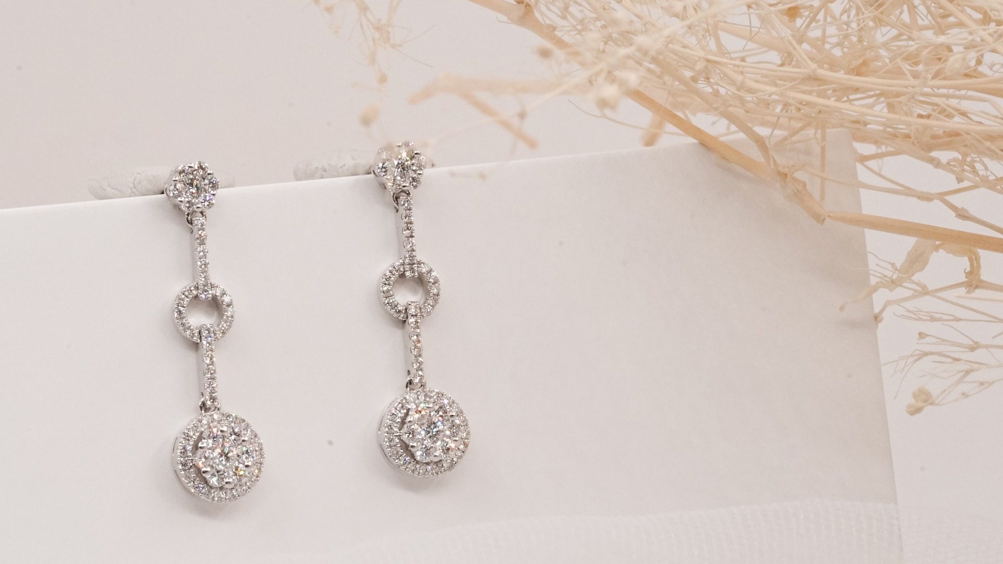 Pair of Earring by Michael Trio for Round Face Shape